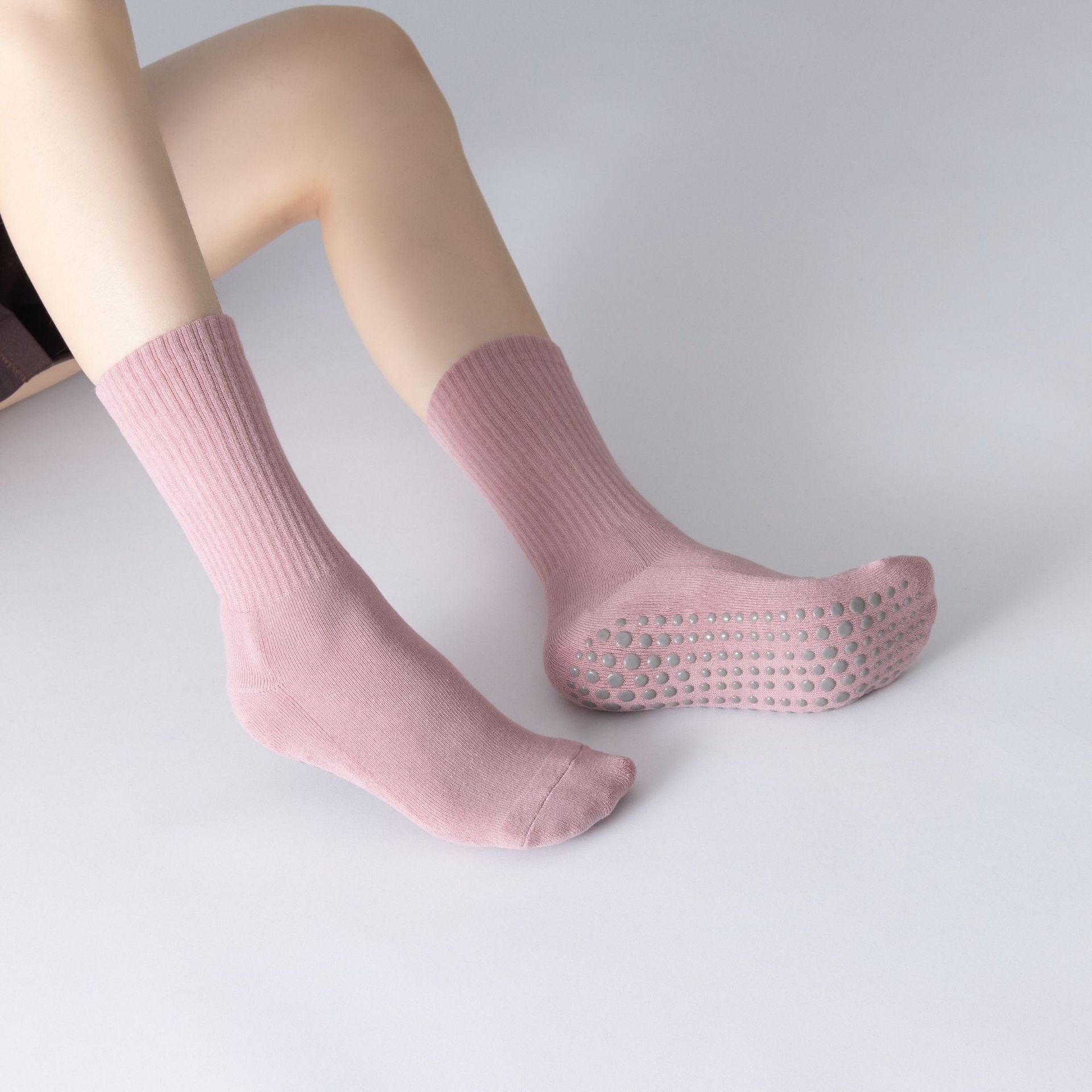 Stay balanced with full-toe grip socks for Pilates, Yoga, and Barre. Non-slip design, arch support, and breathable organic cotton for comfort.