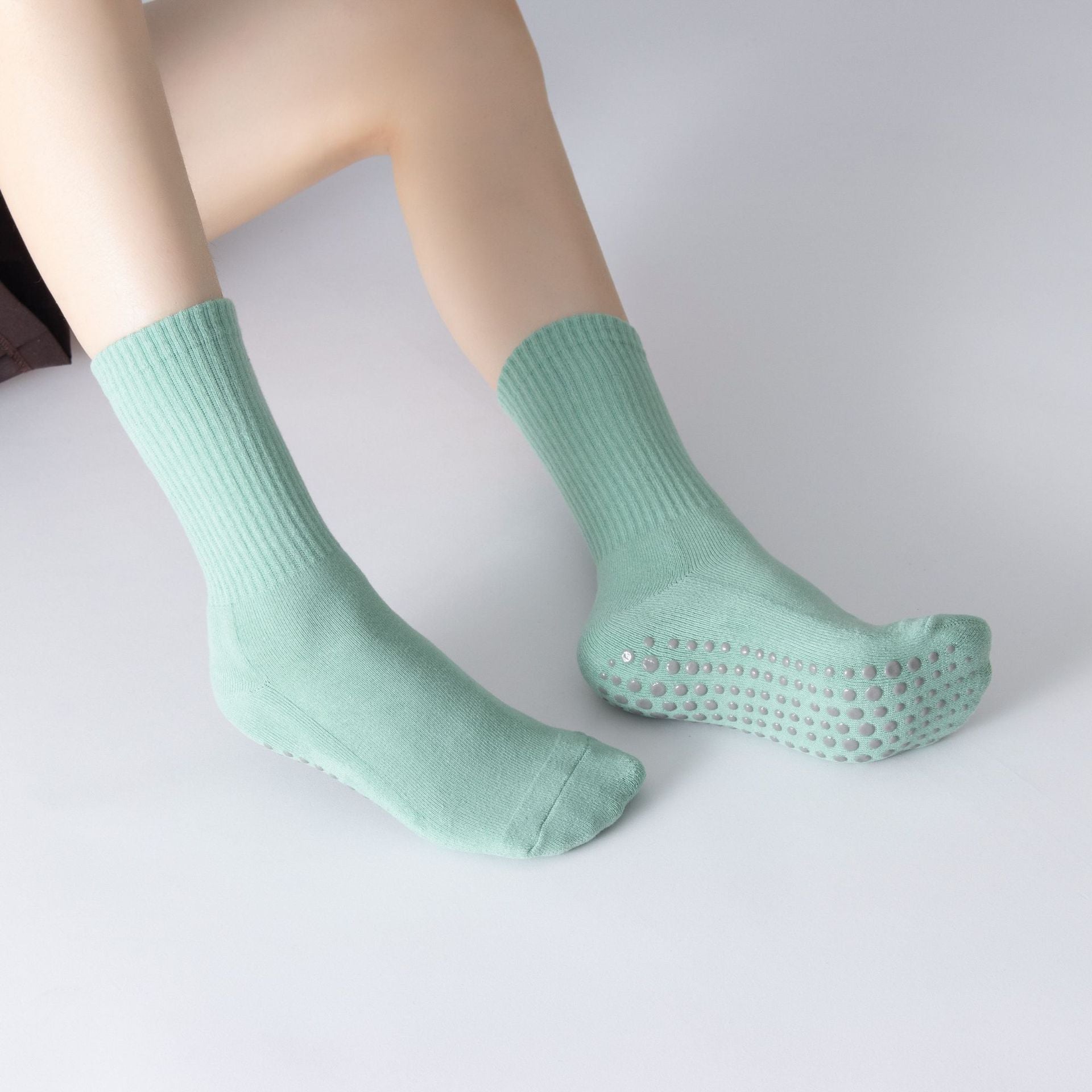 Stay balanced with full-toe grip socks for Pilates, Yoga, and Barre. Non-slip design, arch support, and breathable organic cotton for comfort.